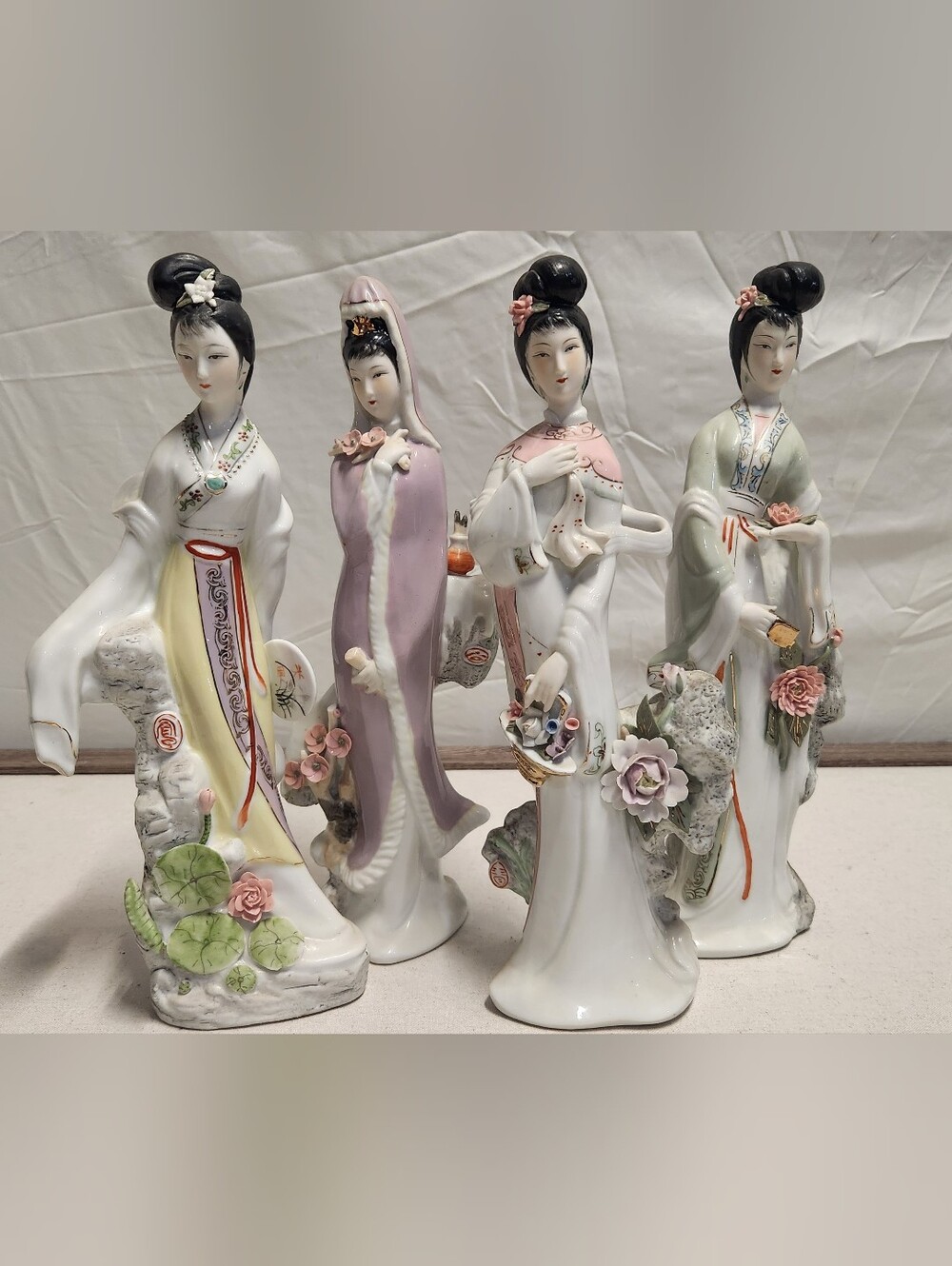 vintage set of four porcelain figurines representing the "Four Seasons Beauties"